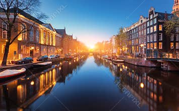 Colorful cityscape at sunset in Amsterdam, Netherlands