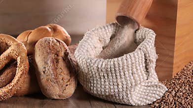 Grinding wheat to make whole grain flour