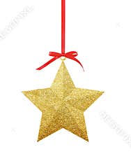 Golden Christmas star on red ribbon isolated on white