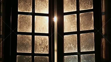 Old dirty fabulous windows are closed inside.