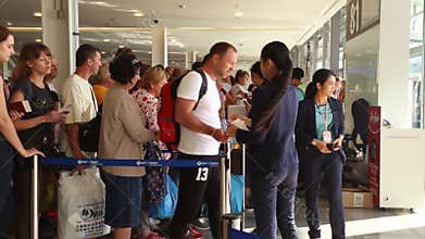 Phuket, Thailand - February 23, 2017: Passengers go on boarding the plane. The last passport control.