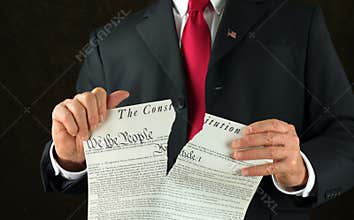 United States politician ripping up and shredding The Constitution representing corruption and injustice