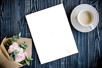 Styled background with coffee, smartphote, roses and magazine co