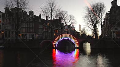 Cruise boat in evening canals of Amsterdam. Time Lapse.