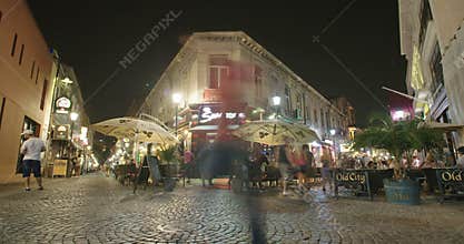 BUCHAREST, ROMANIA - AUGUST 4TH 2017: Time lapse of nightlife at the old city