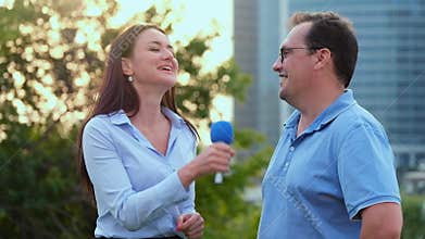 Young girl TV reporter is broadcasting
