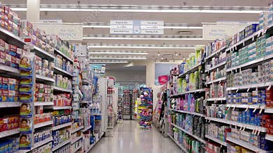 Motion of people looking medicine at pharmacy section