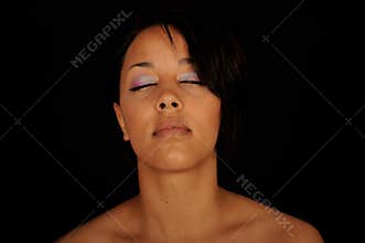 Woman with eyes closed