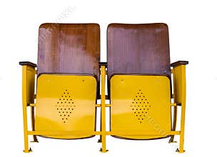 Old rusty cinema chair isolated on white background