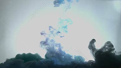 Smoky blue and pink ink in motion on water. Abstract pattern with blue colours ink in water. Blue Smoke goes down