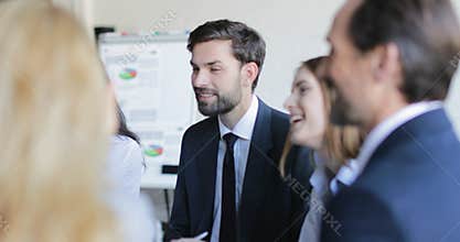 Group Of Business People Discussing New Plan Of Project During Conference Meeting In Board Room, Businesspeople Team