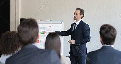 Successful Business Man Leading Presentation On Conference Meeting, Businesspeople Team Listening On Training Seminar