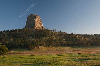 Devils Tover Wyoming Volcano pines morning