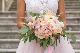 Pink wedding bouquet with roses