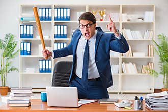 The angry aggressive businessman in the office
