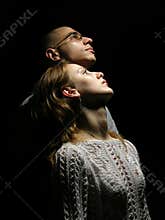 Couple looking to the sky.