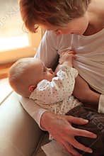 Mother breastfeeding baby