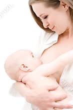 Little baby girl breast feeding.