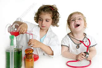 Girls pretending to be doctor in laboratory