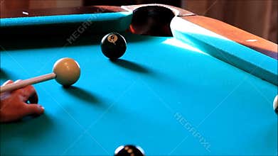 Billiard balls on the green table