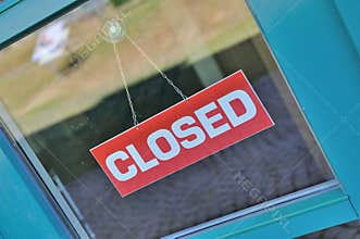 Closed sign on window