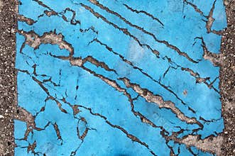 Cracked painted asphalt