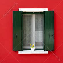 Colorful window with flower pot in Burano