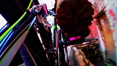 Cyclist Moving Along City Streets