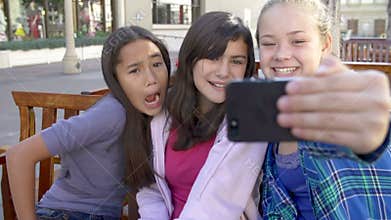 Slow Motion Sequence Of Girls Taking Selfie On Mobile Phone