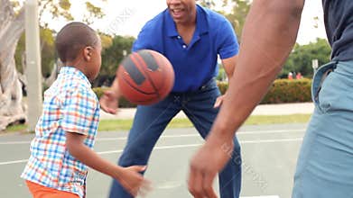 Grandfather With Son And Grandson Playing Basketball