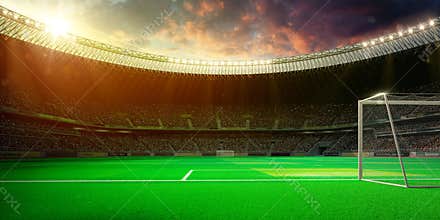 Empty soccer stadium in sunlight