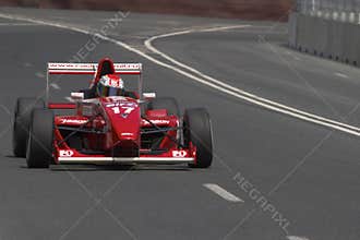 Race cars racing at the grand prix