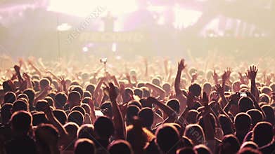 Crowd of people dancing at concert. Dj playing