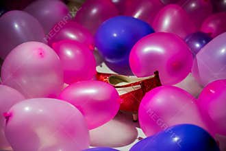 Red Shoes Hidden in Balloons Background