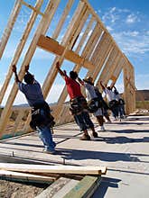 Workers Building a New Home - Vertical