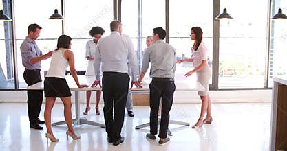 People Attending Business Meeting In Modern Open Plan Office