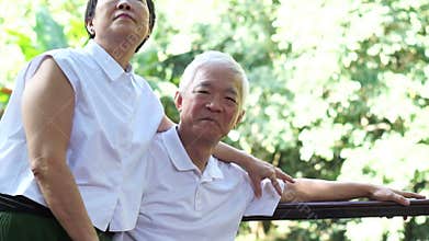 Asian senior couple stay together after retirement. hug and cuddle with love