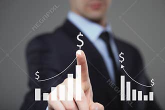 Businessman Touching a Graph Indicating Growth. dollar sign