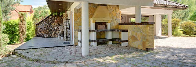 Outdoor relaxation area with fireplace