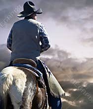 Old Wild West Cowboy and Horse on the Prairie