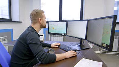 Control room, laborer the operator of the dashboard control production in the command room