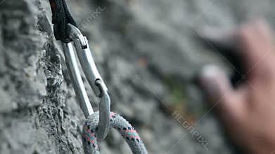 Close up of a hand rock climbing in nature