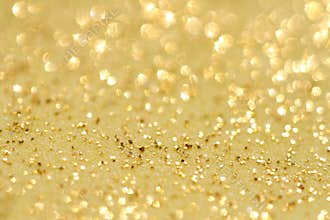 Golden glitter sparkles dust background