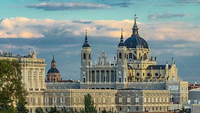Madrid, Spain skyline timelapse at Santa Maria la Real de La Almudena Cathedral and the Royal Palace.