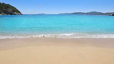 Perfect beach in turquoise aqua color and the waves