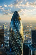 LONDON - OCTOBER 1: Gherkin building (30 St Mary Axe) during sunrise in London on October 1, 2015
