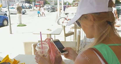 Woman communicating in mobile messenger