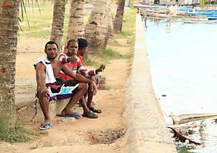 Papuan men posing in Sorong