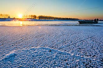 The frozen river sunset