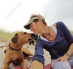 My dog and me on the beach